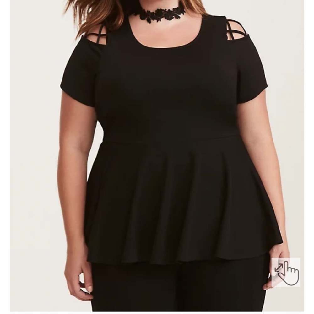 Torrid black peplum top in size 4 (26)